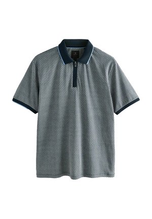Lyhythihainen polo-paita, jossa on geometrinen kuosis, jossa on laivaston sininen kaulus ja vetoketju, pääasiassa sinisen ja valkoisen värin yhdistelmä, jossa on hieno rakenne.