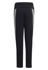 Pantalones deportivos negros con cintura elástica, que presentan tres rayas blancas verticales a lo largo de los lados. Tela suave, diseño de pierna ajustada.