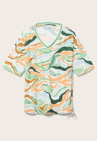 T-shirt à manches courtes avec col en V, motif abstrait ondulé vert, orange, blanc et beige, et cordon ajustable à l'ourlet.