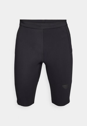 Czarne szorty rowerowe wykonane z elastycznego materiału, o gładkiej teksturze, dopasowanym fasonie oraz subtelnym logo na dolnej części nogawki.