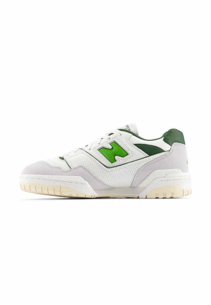 White sneaker with green accents, made of leather and suede. Features a textured upper, padded collar, and a rubber sole with visible tread.