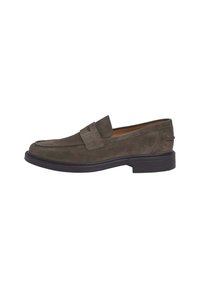 Suede loafers in olive green with a round toe, front strap detail, and a black rubber sole, featuring subtle stitching accents.