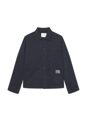 Navy blue cotton jacket with a collar, front button closure, two large pockets, and a textured patch detail on the left pocket.