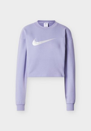 Ανοιχτό μωβ cropped φούτερ κατασκευασμένο από μαλακό ύφασμα, με μεγάλο ασημί λογότυπο Nike στο μπροστινό μέρος και ριμπ μανσέτες.