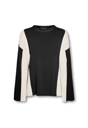 Suéter en bloques de color negro y crema con cuello alto y mangas largas. Material de punto suave, corte relajado y diseño angular único.