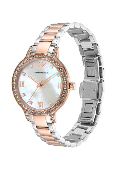 Rose gold and silver stainless steel watch with a mother-of-pearl dial, crystal accents, Roman numeral markers, and a link bracelet design.