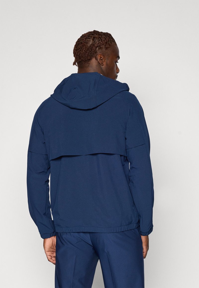 Veste coupe vent Umbro by Bleu foncé