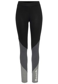 Svart och grå träningsleggings med en färgblockdesign, en mjuk yta och "Bench."-logotyp på benet.