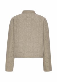 Beige Steppjacke mit Stehkragen, strukturiertem Stoff und langen Ärmeln. Verfügt über horizontale und vertikale Nähmuster.