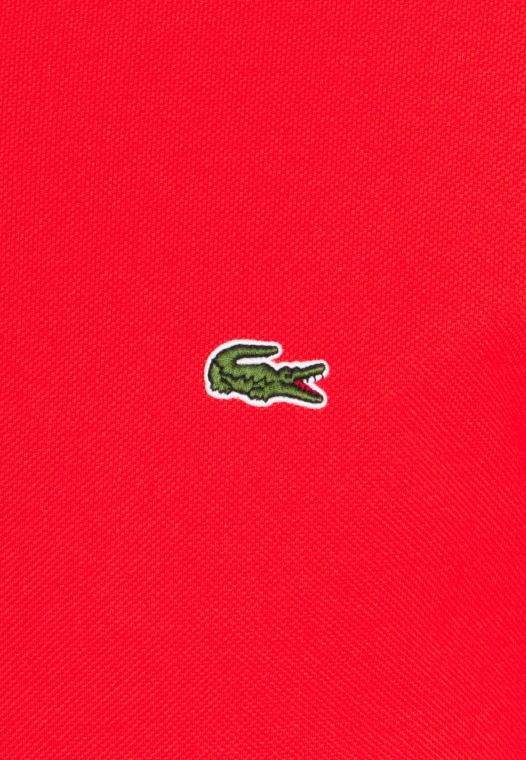 lacoste polo logo