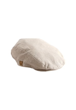 Beige platte pet gemaakt van gestructureerde stof met een klein bruin label met een berengezicht logo aan de zijkant.