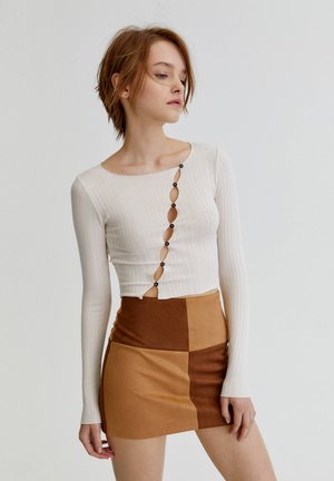 Long sleeved top - mottled beige