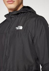 The North Face HIGHER RUN JACKET - Jachetă de vânt - black