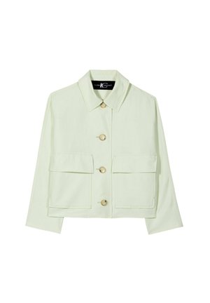 Light beige cropped jacket with pointed collar, four front buttons, and two large flap pockets.