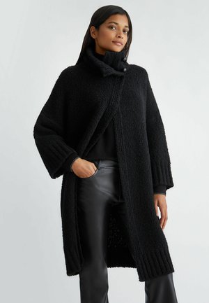 Gilet Barcelona bouclè avorio – Abbigliamento Donna Milano | roderì