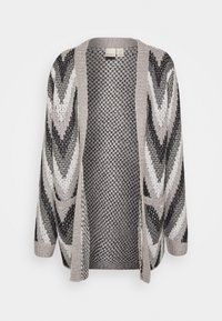 Cardigan en maille avec un motif chevron en noir, blanc et gris. Devant ouvert, manches longues et deux poches avant. Tissu texturé.
