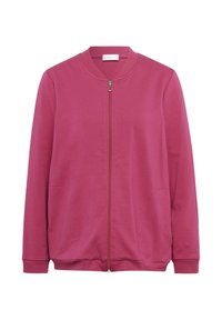 Sweatshirt zippé fuchsia en tissu doux, avec un col rond, des manches longues et deux poches avant. Design uni sans motifs.