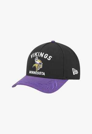 Black cap with a purple brim, featuring "VIKINGS" and "MINNESOTA" embroidered in white. Includes a Viking logo on the front and leaf pattern on the brim.