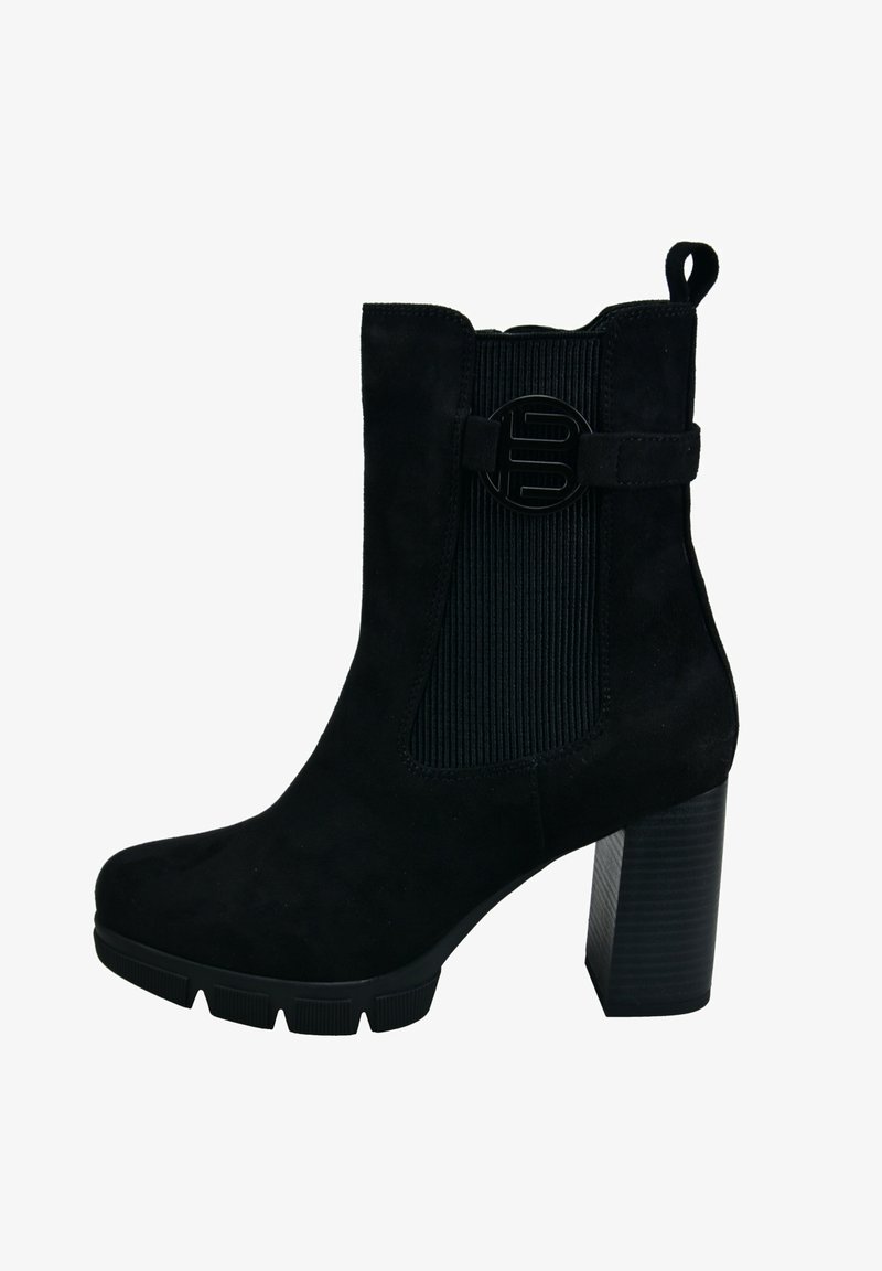 Botín negro de ante hasta el tobillo con tacón cuadrado, panel lateral elástico acanalado y acento circular con logo negro. Suela de goma texturizada.