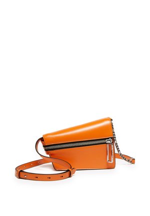 Small orange leather crossbody bag with diagonal zip closure, silver zipper pull, adjustable strap, and metal chain detail on one side.