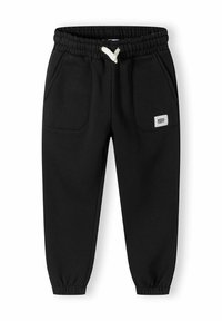 Zwarte joggingbroek gemaakt van zachte stof, met een elastische tailleband met een trekkoord, zijzakken en een logo-label aan de voorkant.