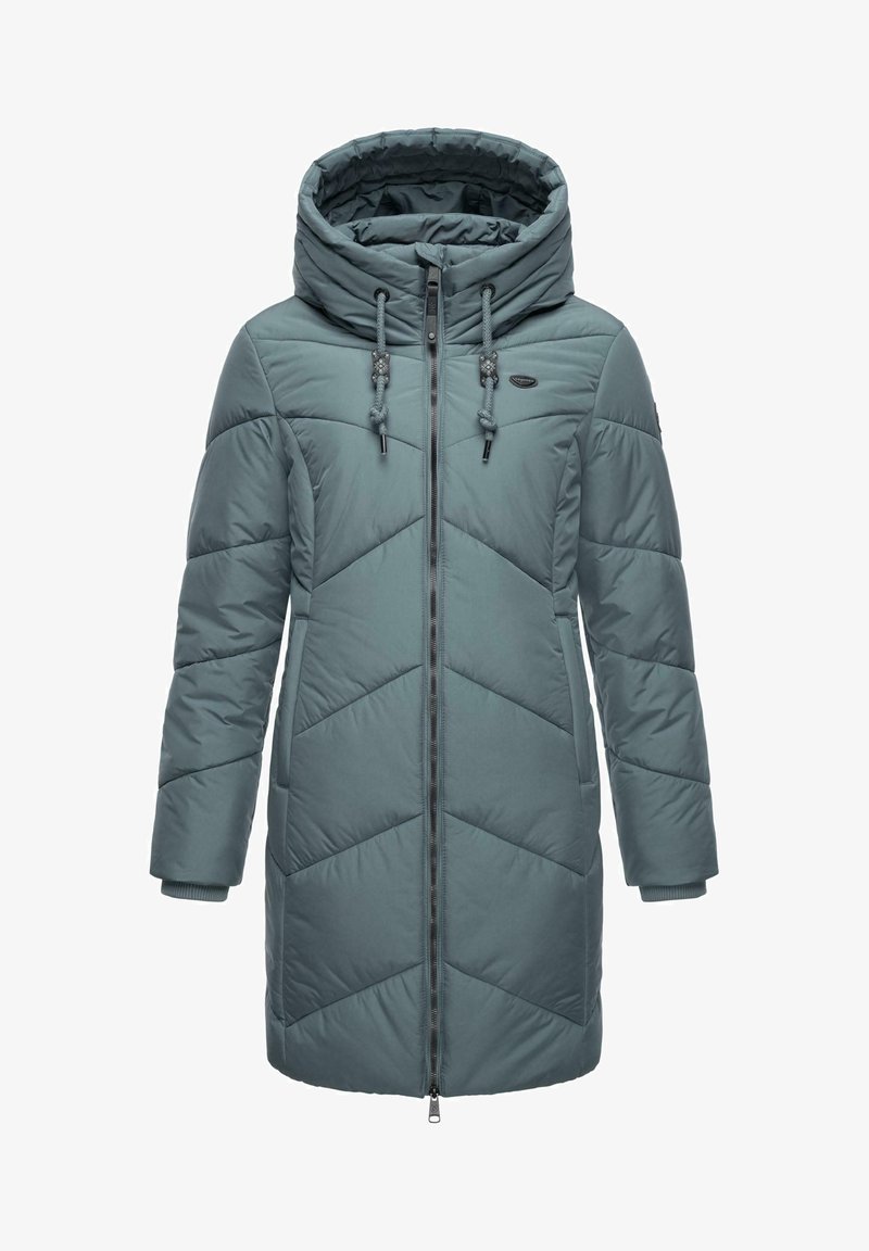 Tirkīza krāsa pūkaina jaka ar kapuci, ar rāvējslēdzēju priekšā, regulējamiem auklām un ševrona struktūru. Izgatavota no gludas, ūdensizturīgas materiāla.