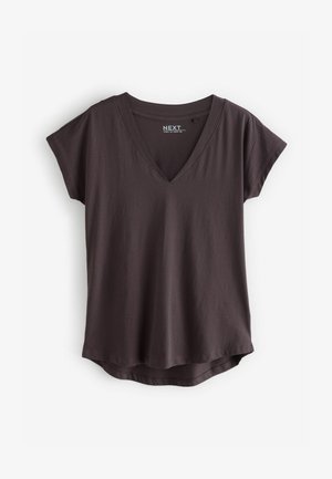 Tumedat hallid V-kaelusega lühikeste varrukatega T-särk, mis on valmistatud pehmest kangast. Omab kaarduvat allääre ja lõdvestatud sobivust. Brändi silt on nähtav seestpoolt.