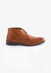 Sélectionné, tan brown