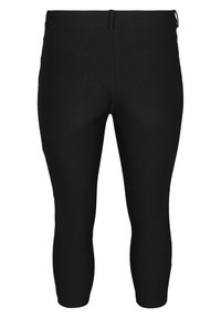 Zwarte capri leggings van rekbaar materiaal, met een hoge tailleband en een soepele textuur. Geen zichtbare patronen of hardwaredetails.