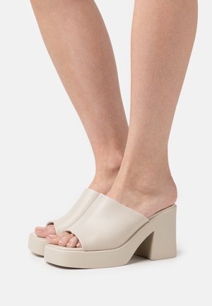 Call it Spring, Korolliset pistokkaat - light grey