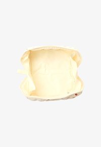 Cosmetyczka z zamkiem, wykonana z kremowego materiału o gładkiej strukturze. Wnętrze jest jasnożółte, bez przegródek, z małym uchwytem.