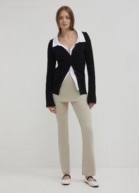 Calliope Strickjacke - noir