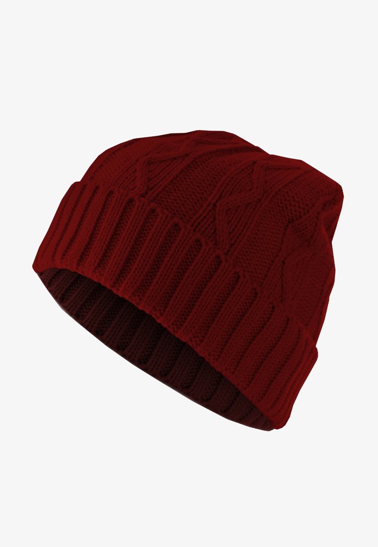 Piros kötött sapka bordás mandzsettával és texturált mintával. A tetején gyémántmintázat található, ami sötét és világos piros árnyalatokat kever.