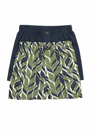 Due paia di boxer da uomo, uno tinta unita blu navy e uno con stampa di foglie verdi e blu navy, entrambi con elastico in vita e chiusura frontale con bottoni.