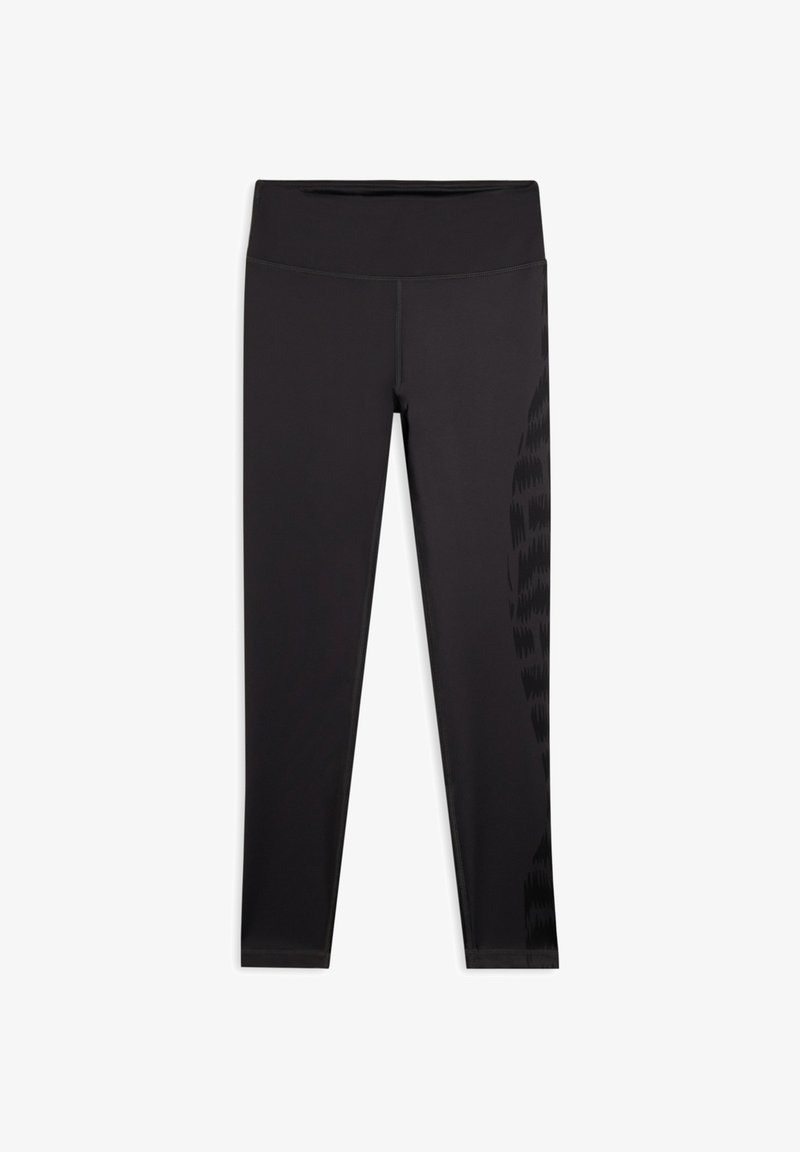 Leggings negros con una cinturilla alta. Presentan un patrón texturizado oscuro a lo largo de la pierna exterior. Confeccionados con una tela elástica que absorbe la humedad.