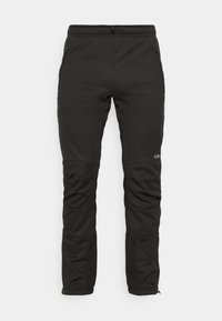 Schwarze Softshell-Hose mit strukturierter Oberfläche, ausgestattet mit Reißverschlusstaschen, einem Kordelzugbund und kontrastierenden Paneeldetails an den Knien.