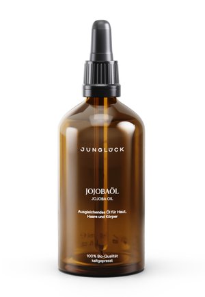 Braune Glasflasche mit schwarzem Tropferdeckel, etikettiert mit Jojobaöl für Haut, Haare und Körper, 100 % biologisch kaltgepresst von Junglück.