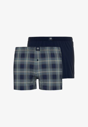 Zwei Paare Herrenunterhosen: Eine zeigt ein blaues und graues Karomuster mit einem elastischen Bund, die andere ist einfarbig marineblau.