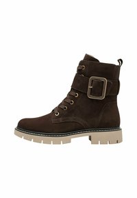 Brown suede ankle boot with a rounded toe, dark brown laces, a chunky beige sole, and a side buckle accent for secure fit.