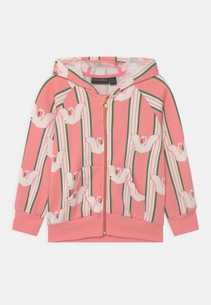 Veste à zip rose pour enfants avec des rayures verticales vertes et blanches et des imprimés de cygnes blancs, dotée d'une poche frontale et d'une capuche.