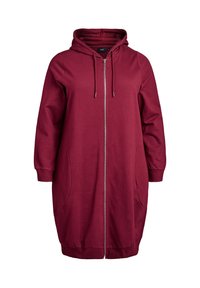 Abito felpa borgogna con zip, ampie tasche laterali, cappuccio con laccetti e polsini a coste. Realizzato in tessuto morbido e resistente.