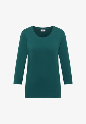 Teal pitkähihaisen paidan, jossa on pyöreä kaula-aukko, yksinkertainen muotoilu ja etiketissä lukee "CECIL" kauluksessa.