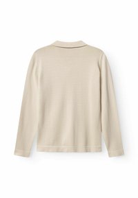 Ljusbeige långärmad tröja med krage. Mjuk stickad material, sömlösa axlar och rak nederkant.