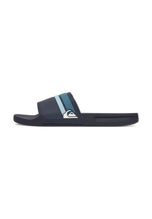 Sandalo blu navy con due strisce blu sulla fascia e un logo bianco sul lato, visto dal profilo sinistro.