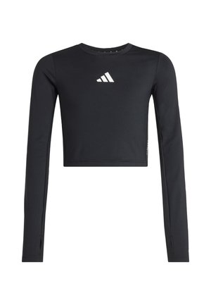 Schwarzes Crop-Top mit langen Ärmeln aus glattem Stoff. Verfügt über ein weißes Logo auf der Brust und Daumenlöcher an den Bündchen.