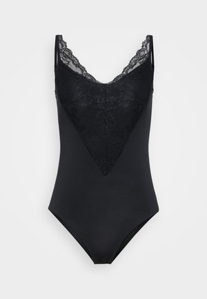 Macaquinho preto com detalhes de renda, apresentando um decote em V e um design ajustado. Textura suave com um recorte triangular de renda na frente.