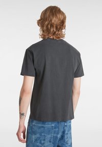 Vans BACKSPIN - Triko s potiskem - black