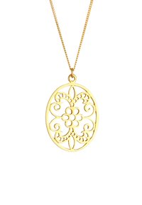 Collar de pendant de oro con un intrincado diseño de corte en forma de flor con remolinos, colocado sobre una cadena delgada, forma ovalada, textura suave.