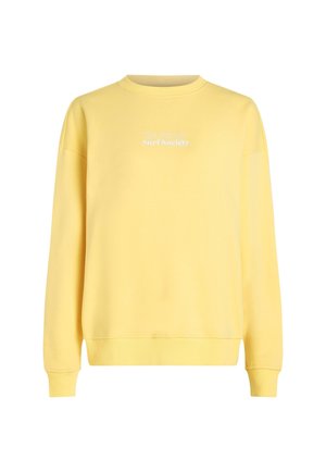 Gele sweatshirt met een ronde halslijn, verlaagde schouders en geribbelde manchetten. Bevat witte tekst met de opdruk "The Future Surf Society" aan de voorkant.