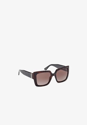 Square sunglasses with a tortoiseshell frame and gradient brown lenses. Features textured black arms with subtle logo accents.